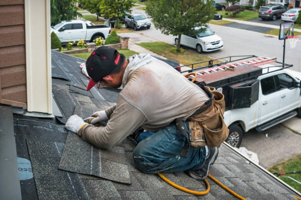 Professional Flat Roof Repair technician working in Woodbury, PA